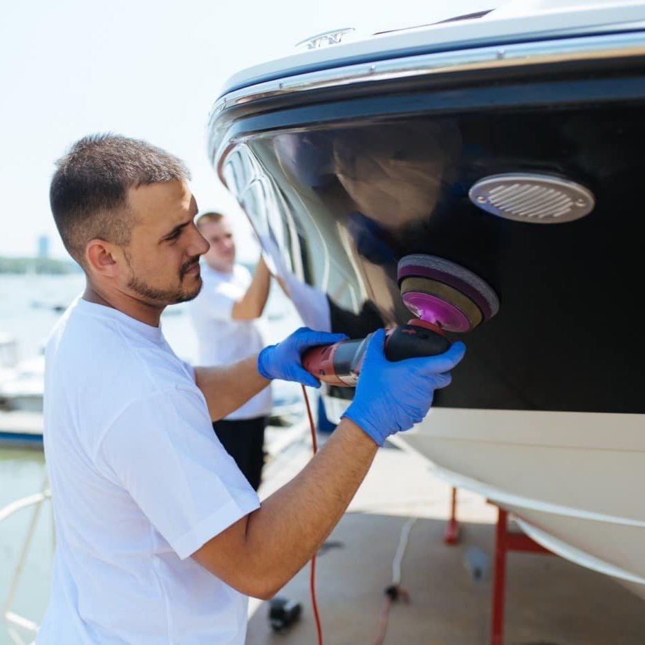 Boat-maintenance-Man-with-or.jpg