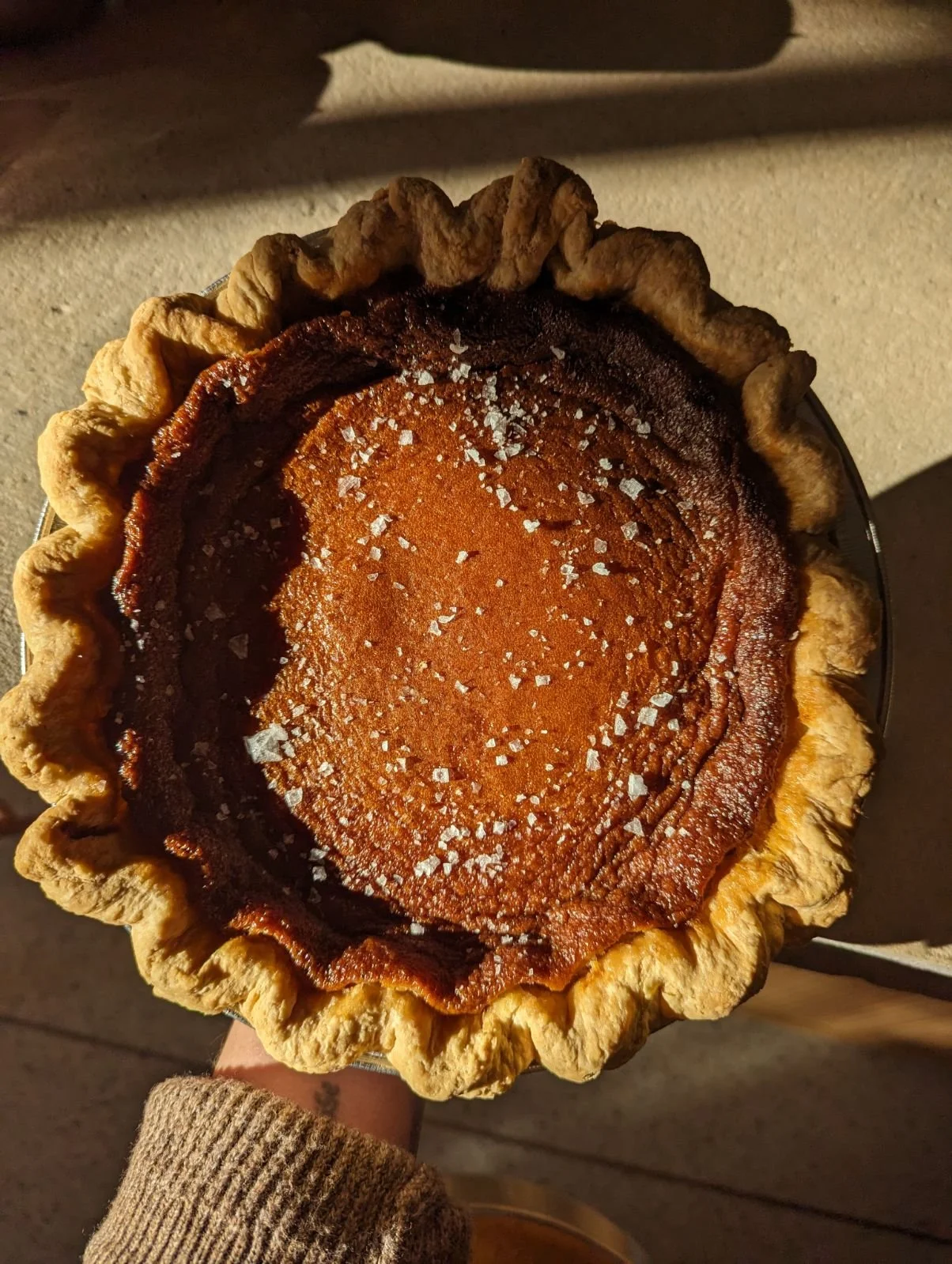 freshly baked pie with salt crystals in the sun