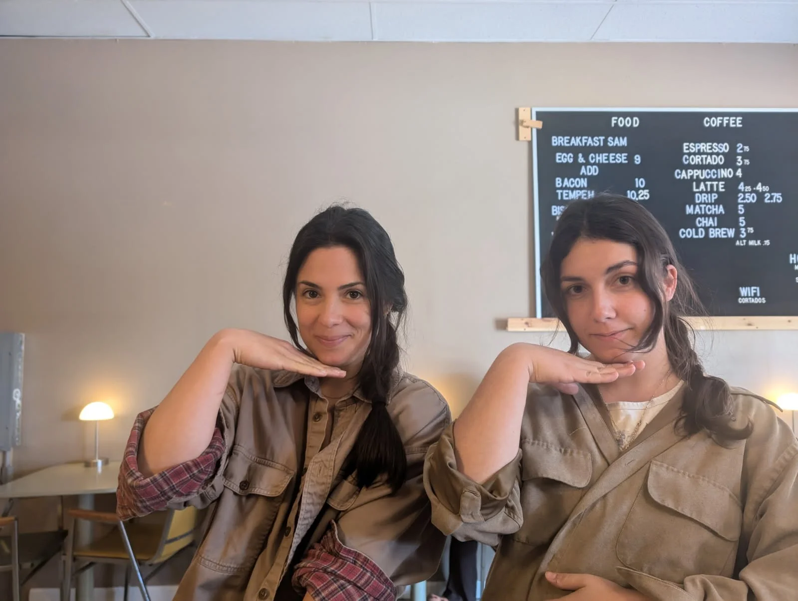 image of two brunette coco employees with braided hair