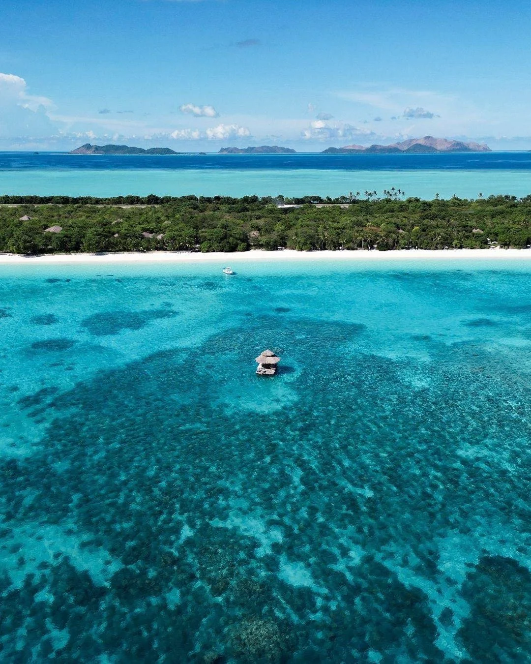 What does the most ultra-private, most exclusive island resort in Southeast Asia actually look like? This.

Amanpulo sits on Pamalican Island in the Philippines, in the Sulu Sea, accessible only by chartered flight from Manila. Here's what you can ex