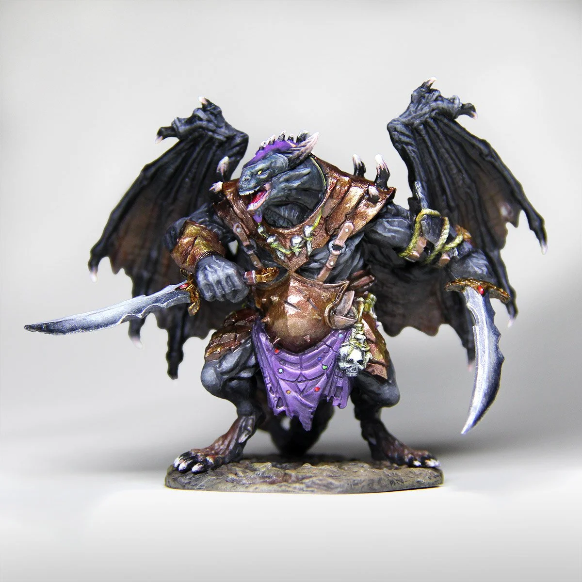 Hand-painted fantasy miniature by Tara Goetz featuring armored draconian with wings and sword.