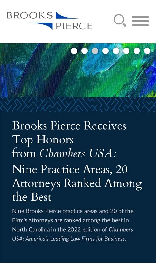 Brooks Pierce mobile homepage with scrolling banner highlighting firm news, attorney updates, and practices.