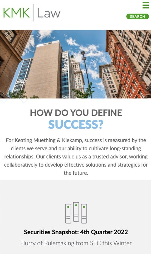 KMK Law mobile homepage featuring a downtown cityscape with the headline “How do you define success?” and an introductory statement about the firm’s client-focused philosophy.