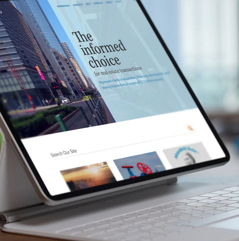 tablet displaying Porter Hedges law firm website homepage with a clean, modern layout and city-focused hero image.