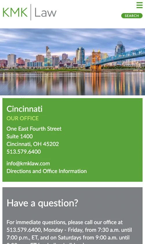 KMK Law mobile contact page showing the Cincinnati office location with address, phone number, and business hours, featuring a skyline image above a green contact section.