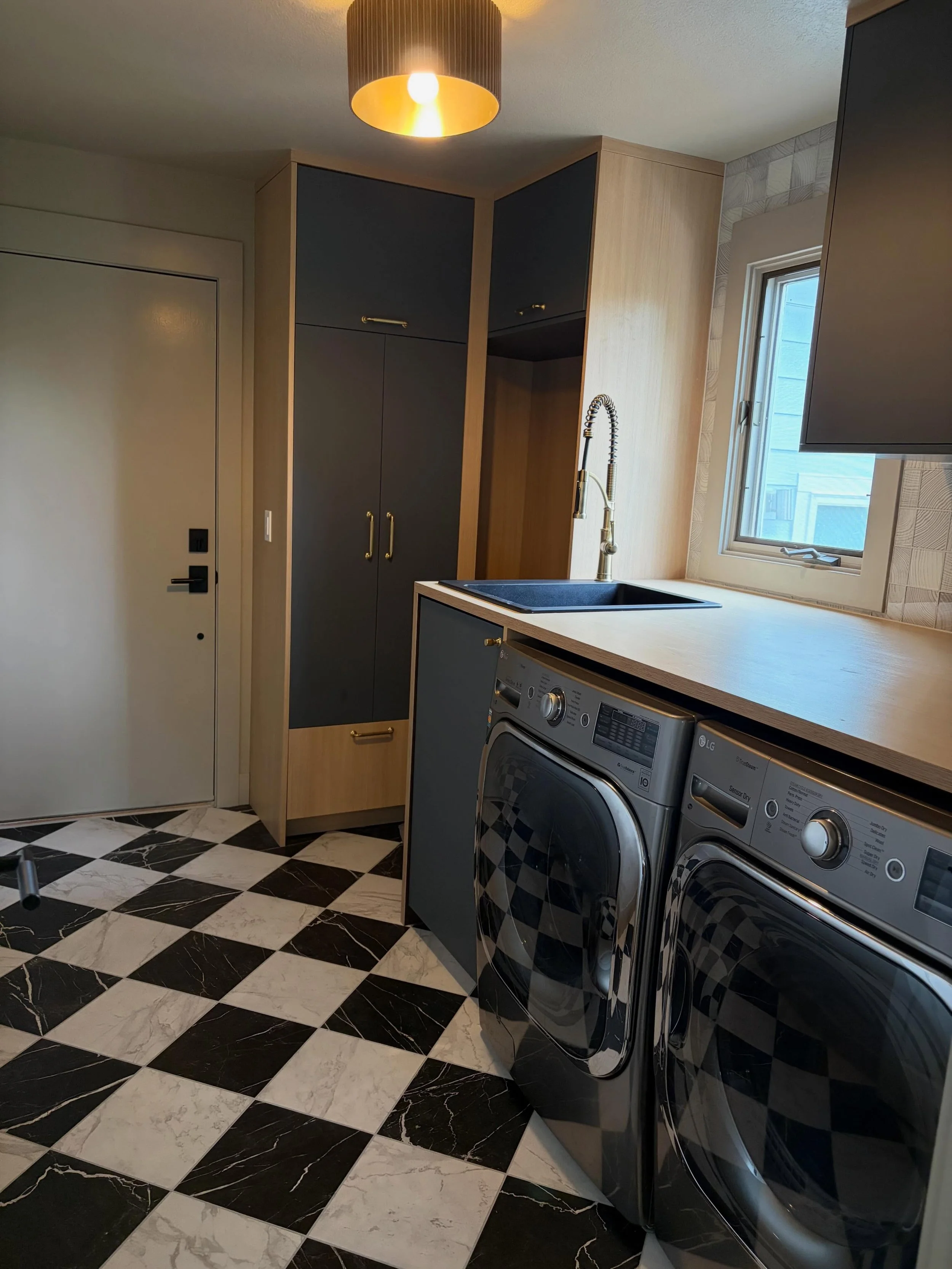 The most overlooked room in your home might be doing the most important job. 🫡

This mudroom is where we walk in from the garage every single day, multiple times a day. And it is our view from the kitchen. It sets the tone for everything that comes 