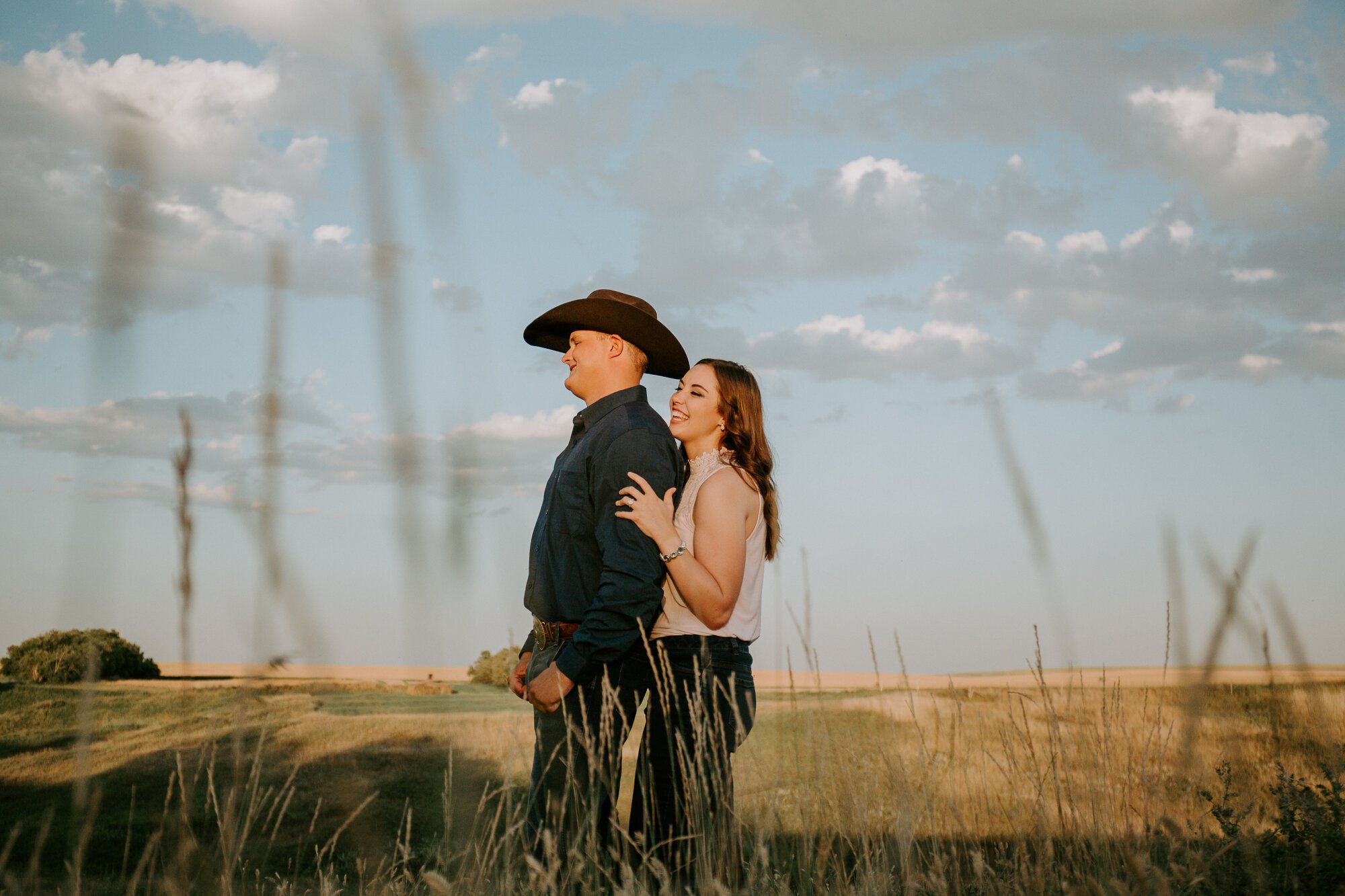 I love that M+R asked to take their engagement photos on M’s family farm. Not only does it give  incredible prairie views, it will also host their wedding ceremony next year and I absolutely cannot wait.  
