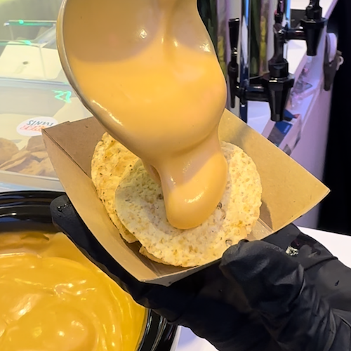chaz events nacho cheese and salsa live station wedding corporate events customised fresh gourmet toppings parsley food premium catering ideal for festivals and corporate gatherings cheese sauce tortilla chips