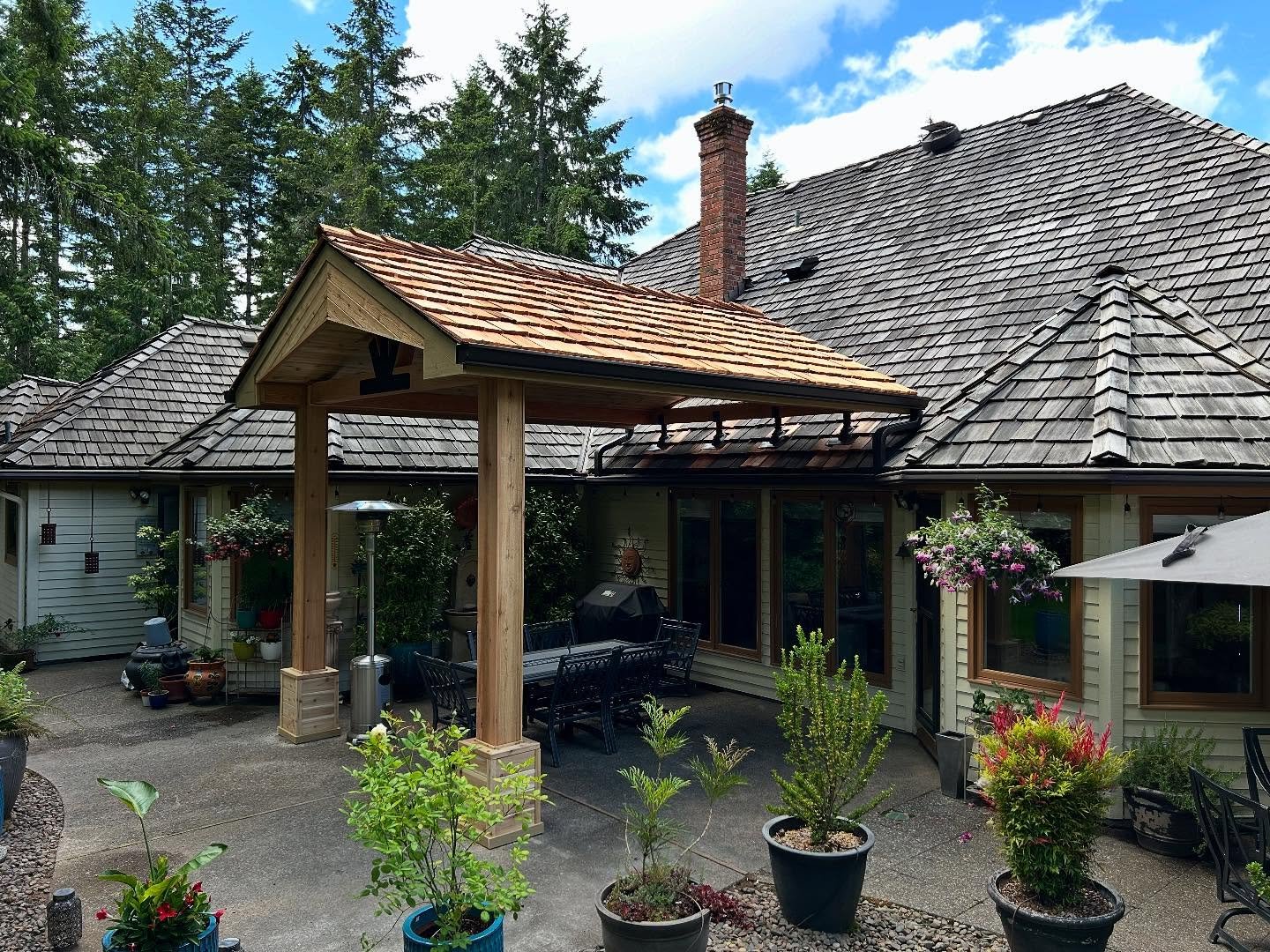 Lake Oswego | Patio Cover with Cedar Shake roofing to match this lovely home.
