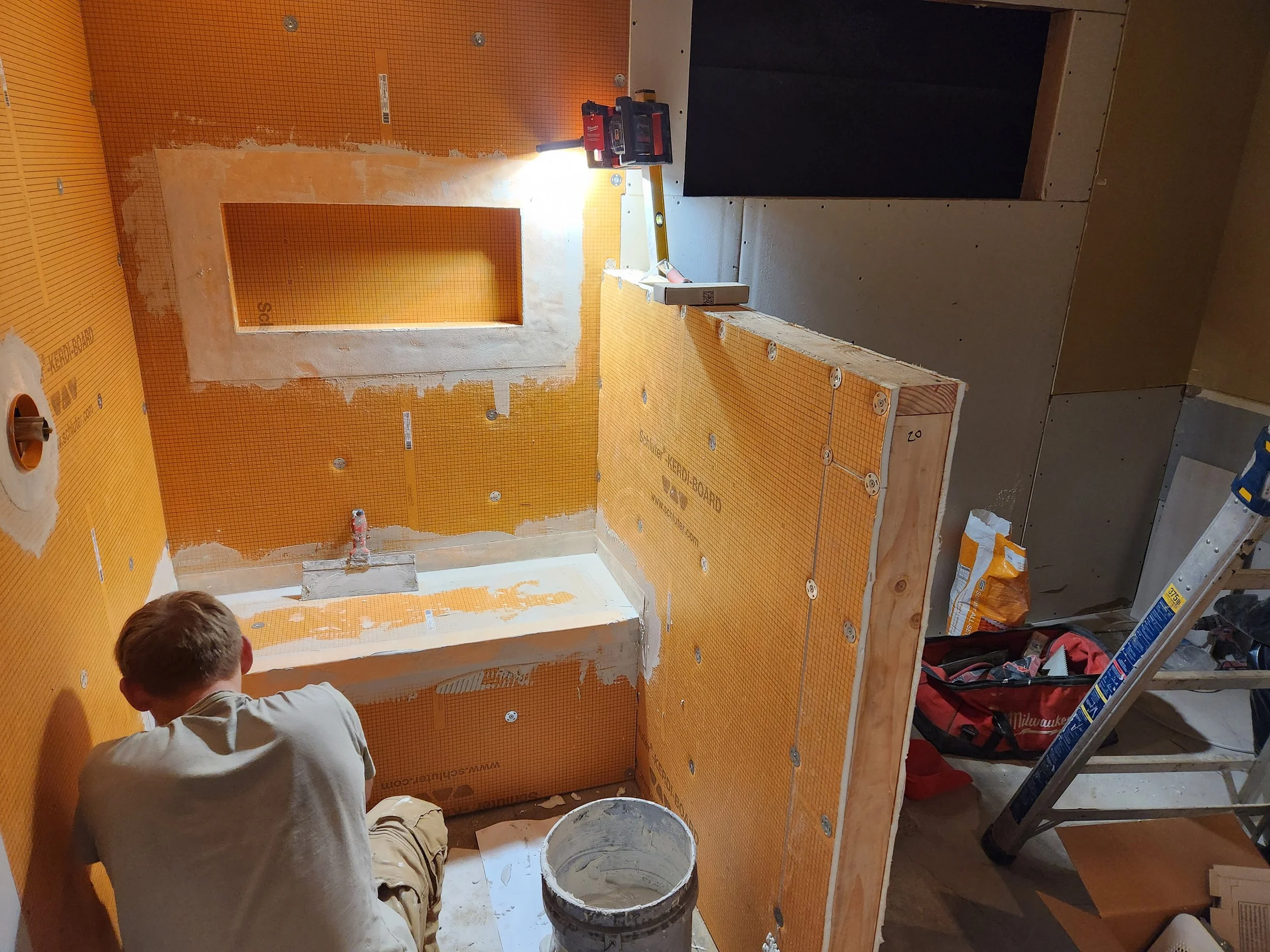 New shower with a bench and a niche