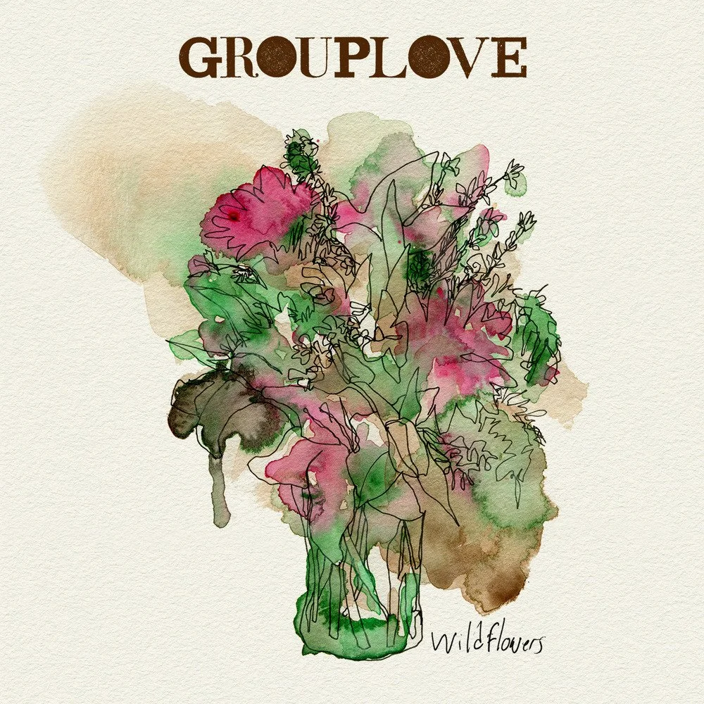 A watercolor-style illustration of a bouquet of wildflowers in a glass jar with the words "GROUPLOVE" at the top and "Wildflowers" written at the bottom.
