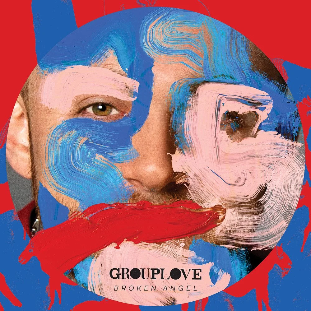 An album cover combining a partially visible man's face with painted brush strokes in blue, pink, black, and red, with the text 'GROUPLOVE BROKEN ANGEL' at the bottom.
