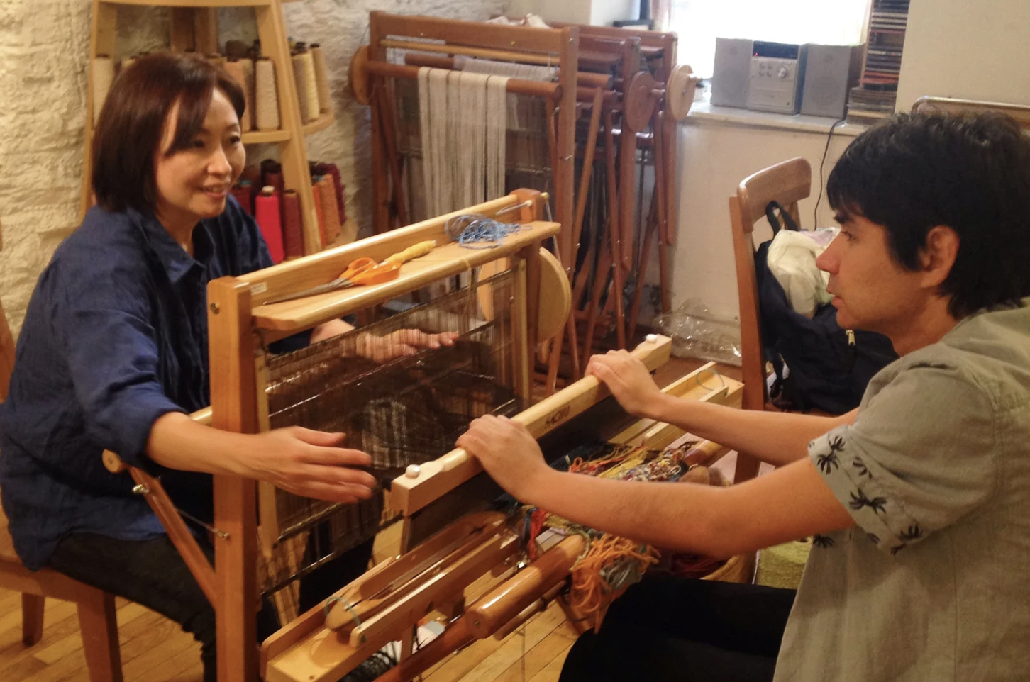 Weaving at the Looms