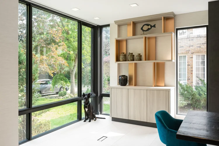 North York second storey addition by First Place Homes: floor-to-ceiling windows and built-in shelving