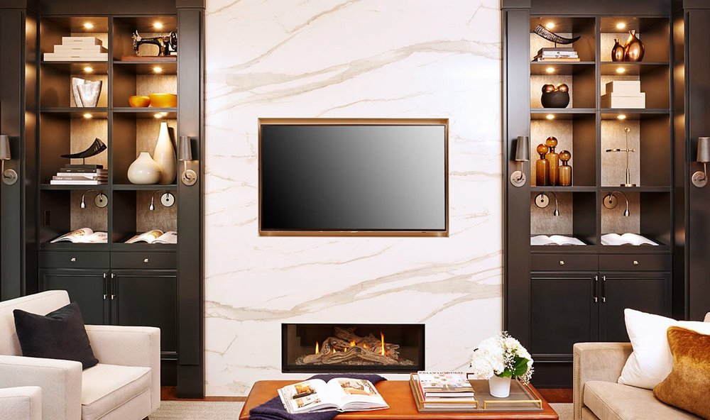 Toronto home addition by First Place Homes: family room with a linear fireplace, marble wall and built-in shelving