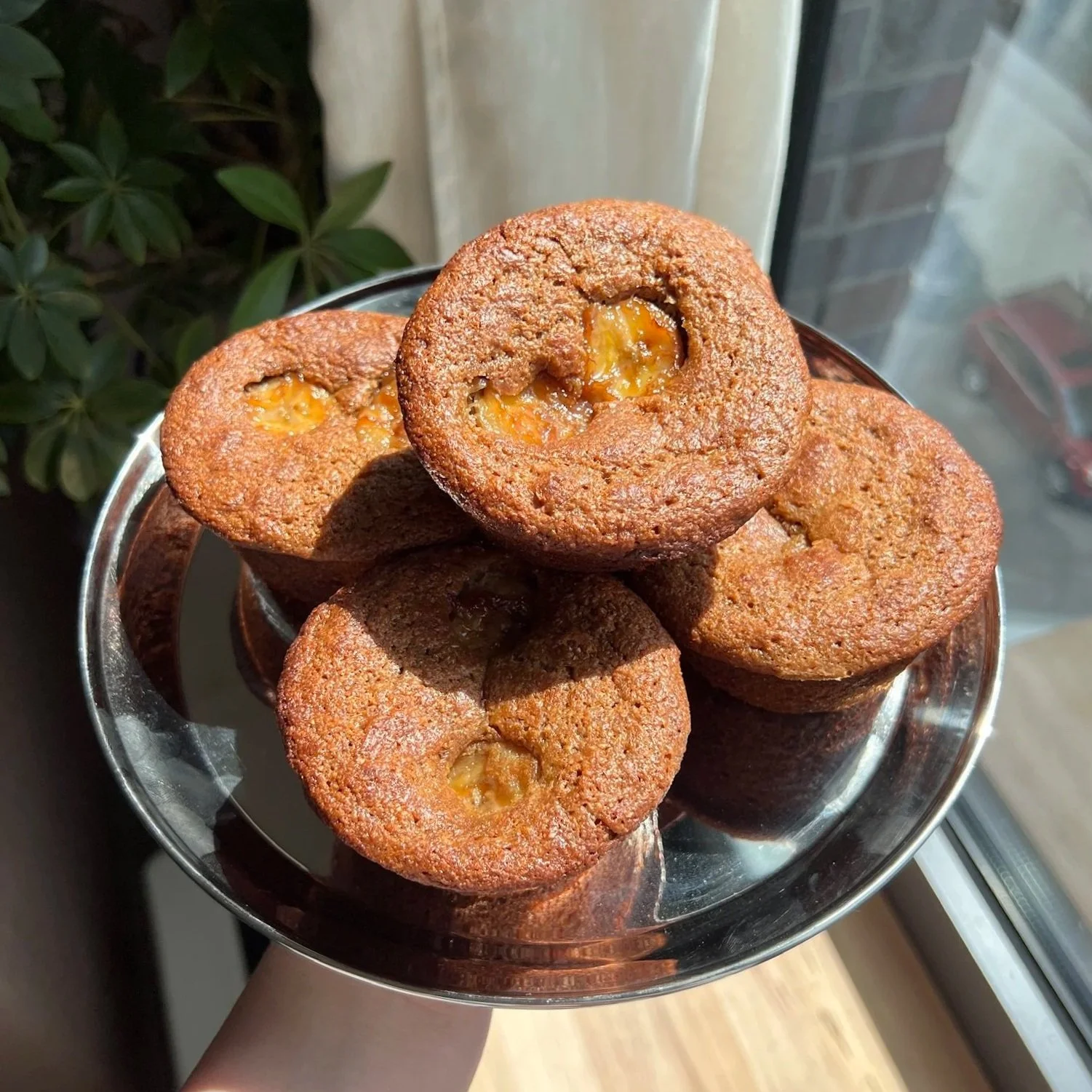 A plate with five bran banana muffins