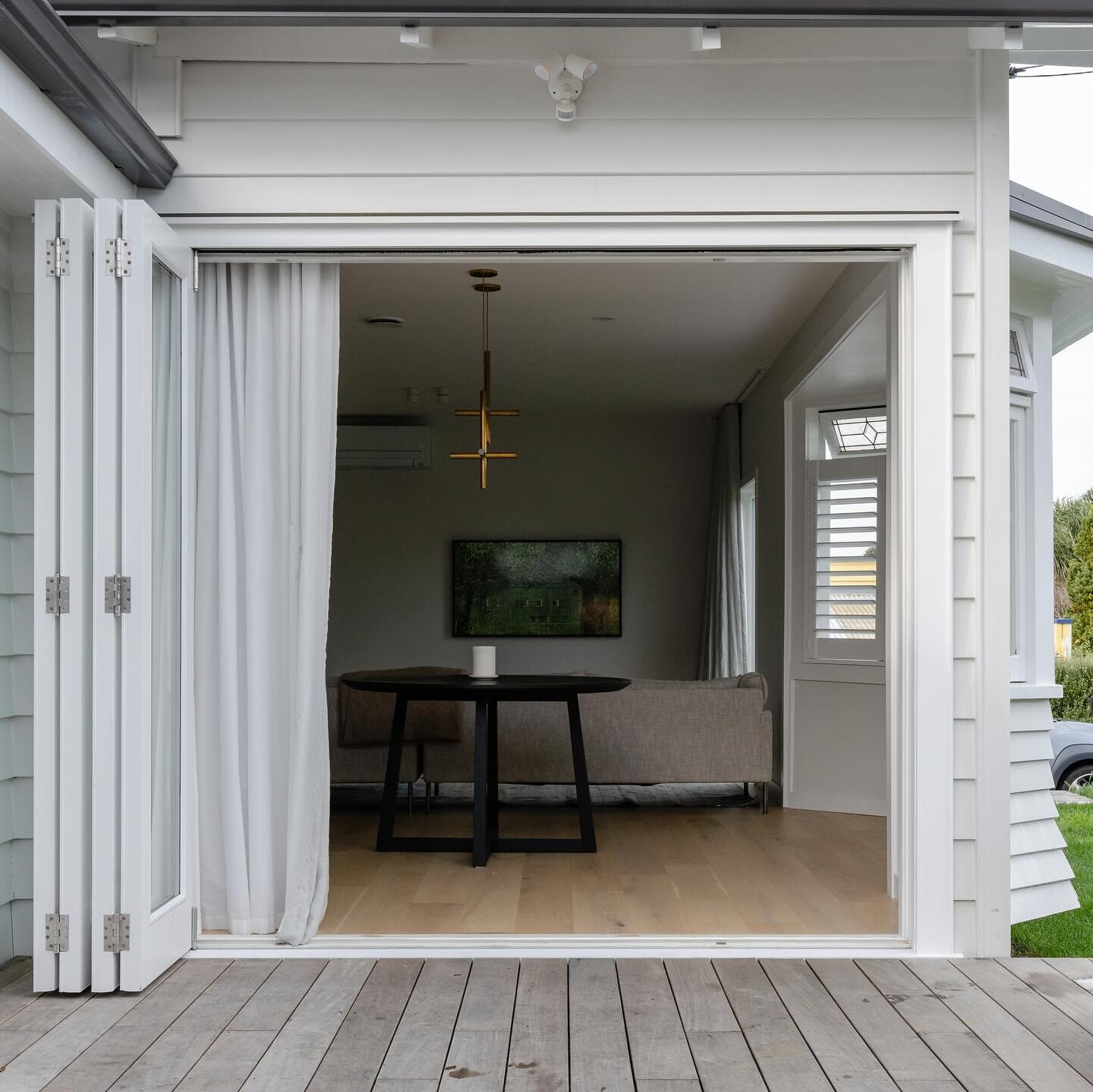 With a few skill saw cuts here, a nice big lintel there, and combining those with a new, beautiful set of timber bi-fold doors, you&rsquo;ve now successfully turned a once dimly lit room into a functional indoor/outdoor living area, all while keeping