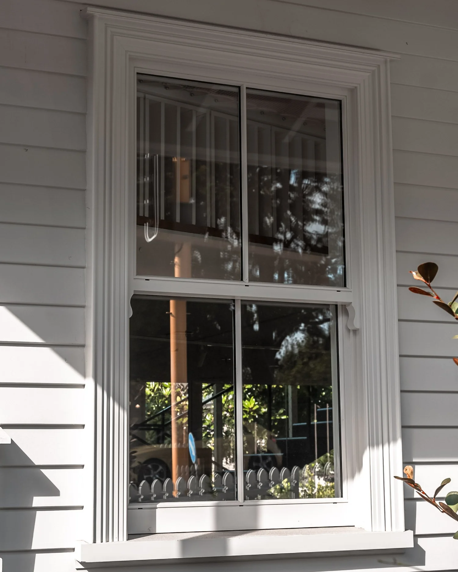 Villa exterior, double hung windows