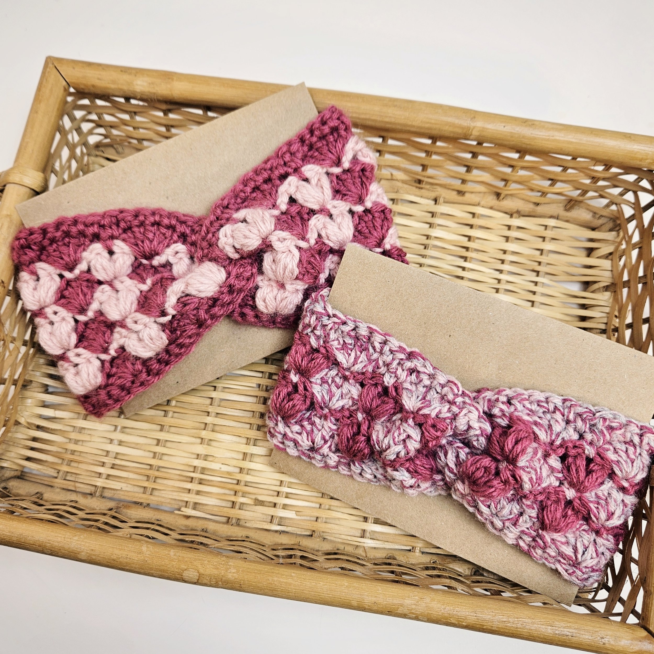 Crochet bobble earwarmer headband with textured puff stitches, a warm and stylish handmade spring accessory.