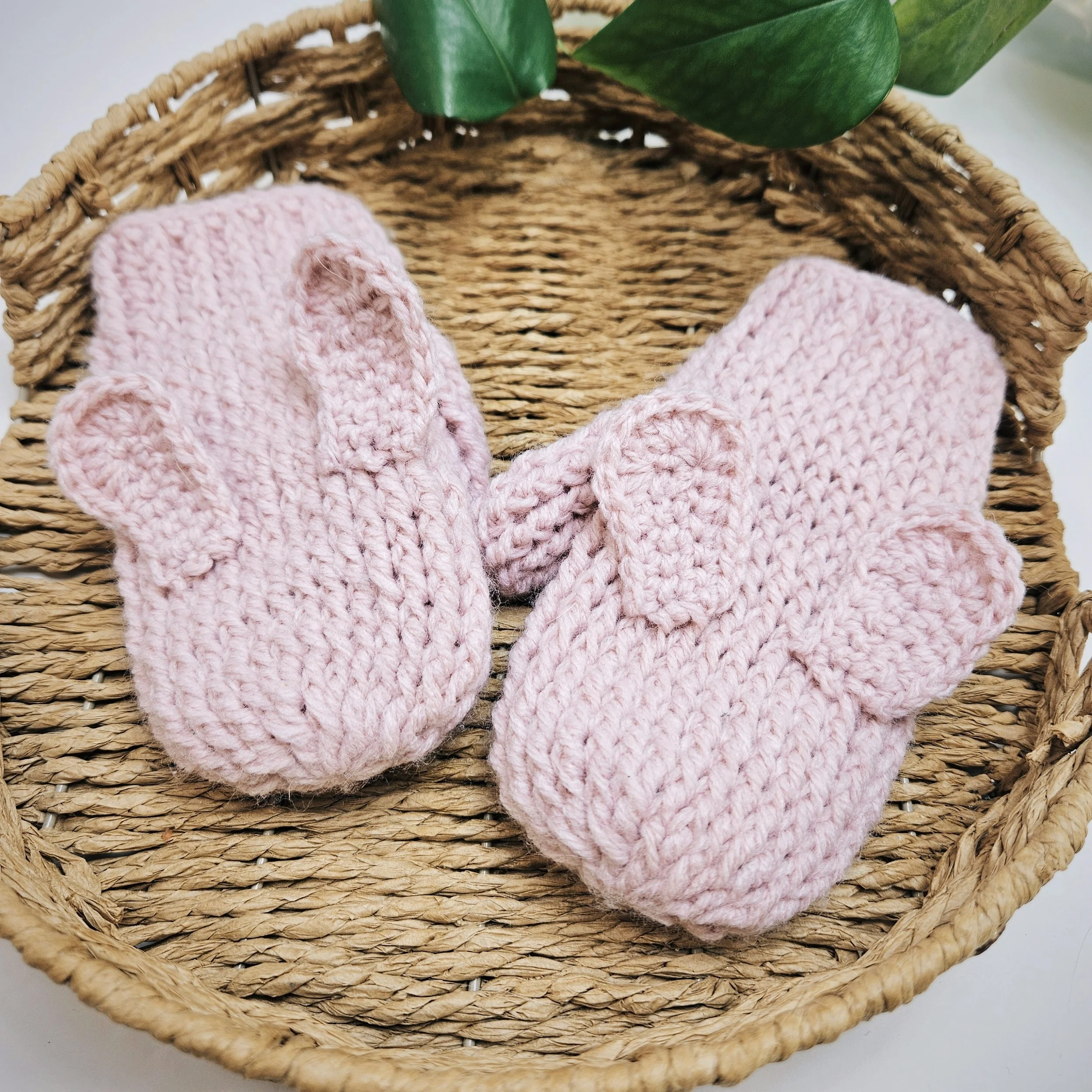 Knit-look crochet bunny mittens with optional ears, a cute and cozy Easter crochet pattern for kids.