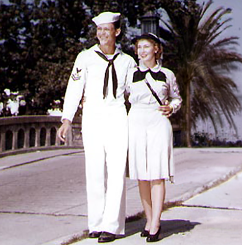 WWII-era couple walking together, representing a wife standing by her husband through his recovery