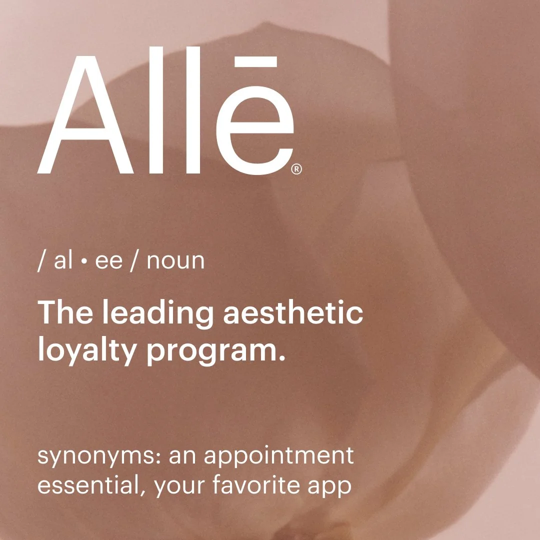 A phone screen displaying the word 'Allé' with a phonetic pronunciation, definition as a noun, and its use as an aesthetic loyalty program. The background features a blurred, abstract design in soft brown and beige tones.