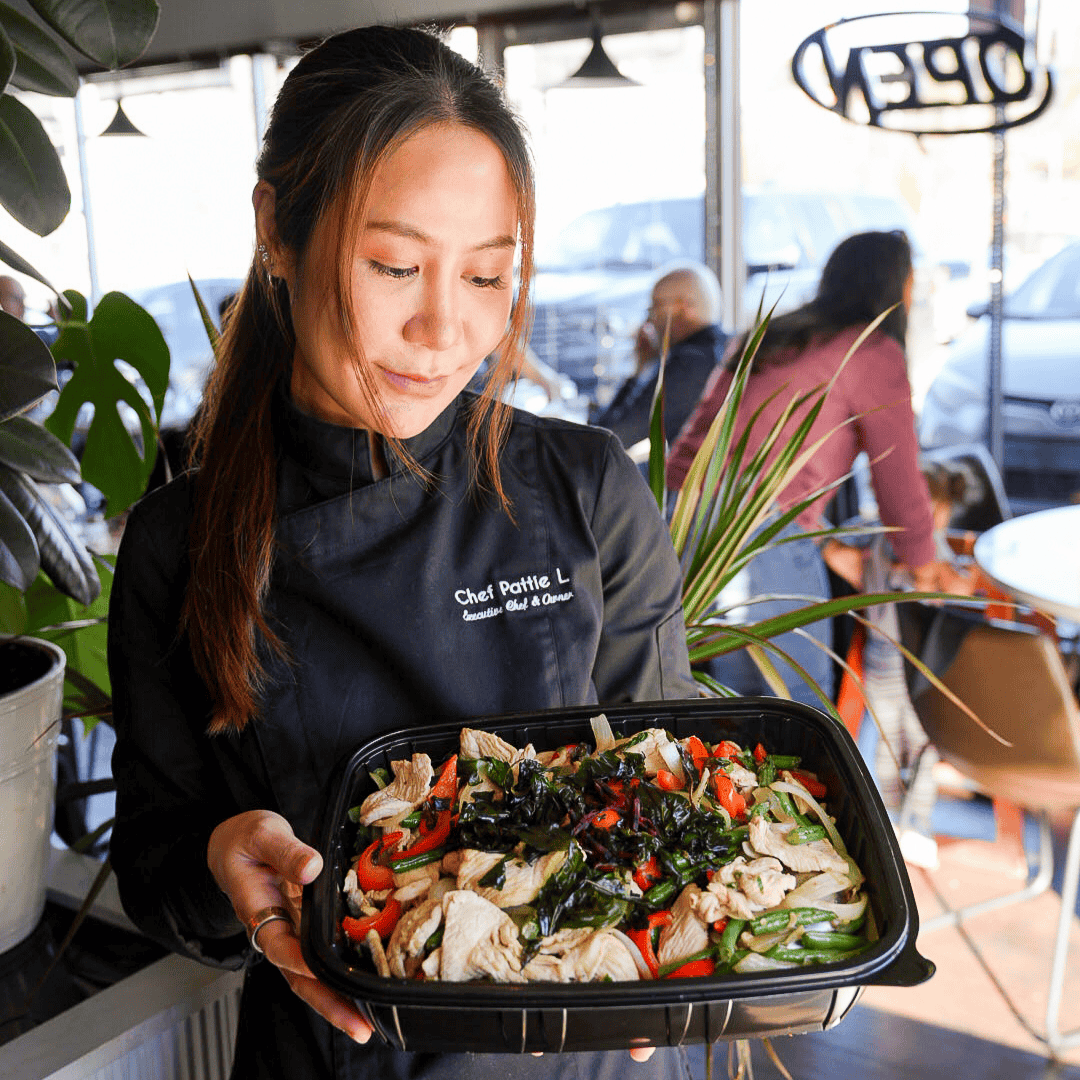 chef pattie holding catering dish