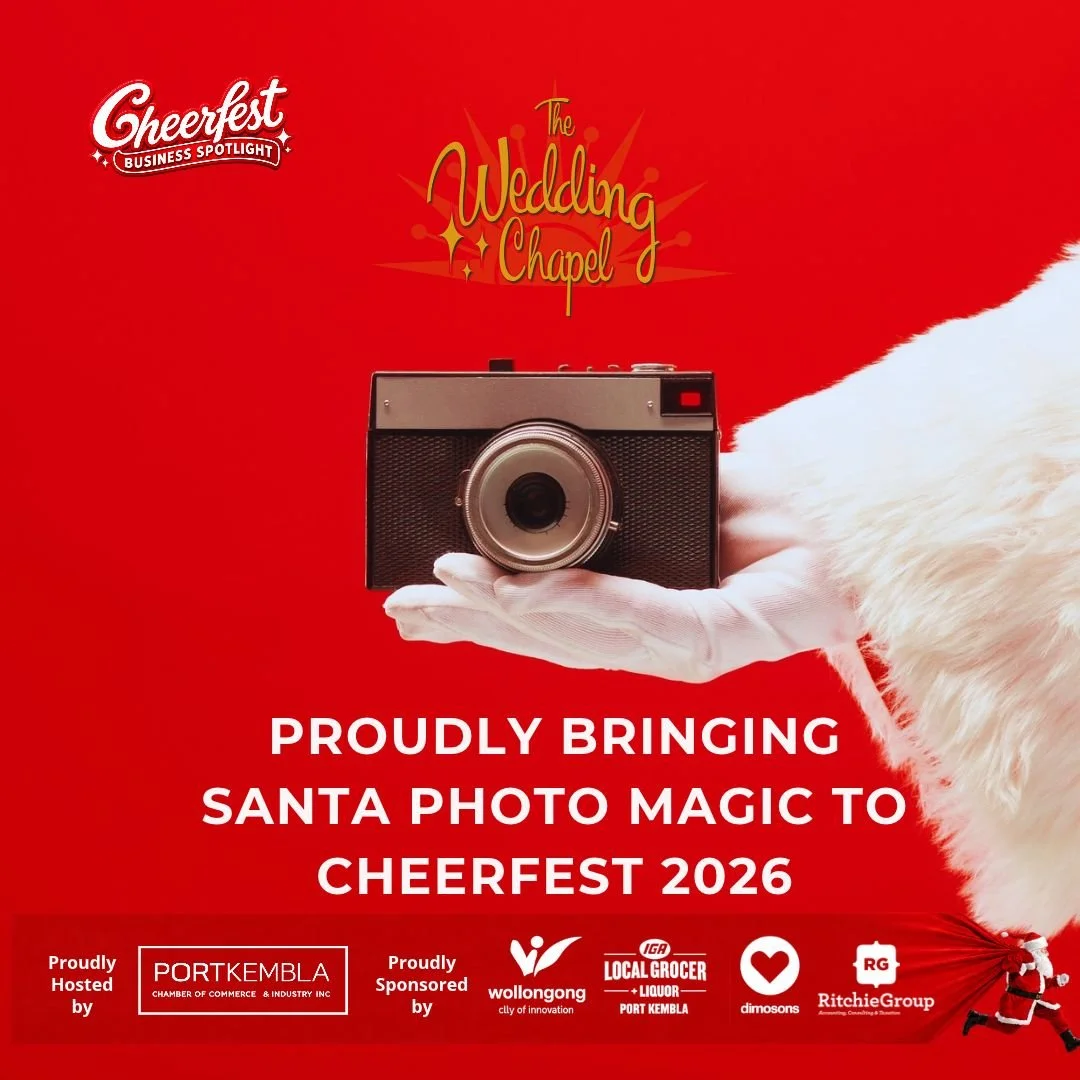 Santa holding a camera at the wedding Chapel on wentworth Street port kembla