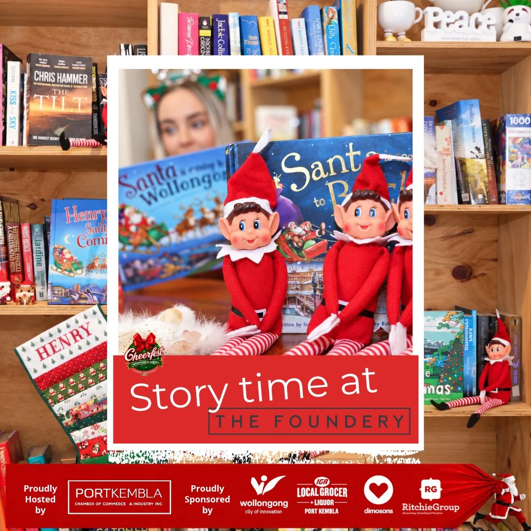 Christomas story book and elves sitting on a cafe shelf