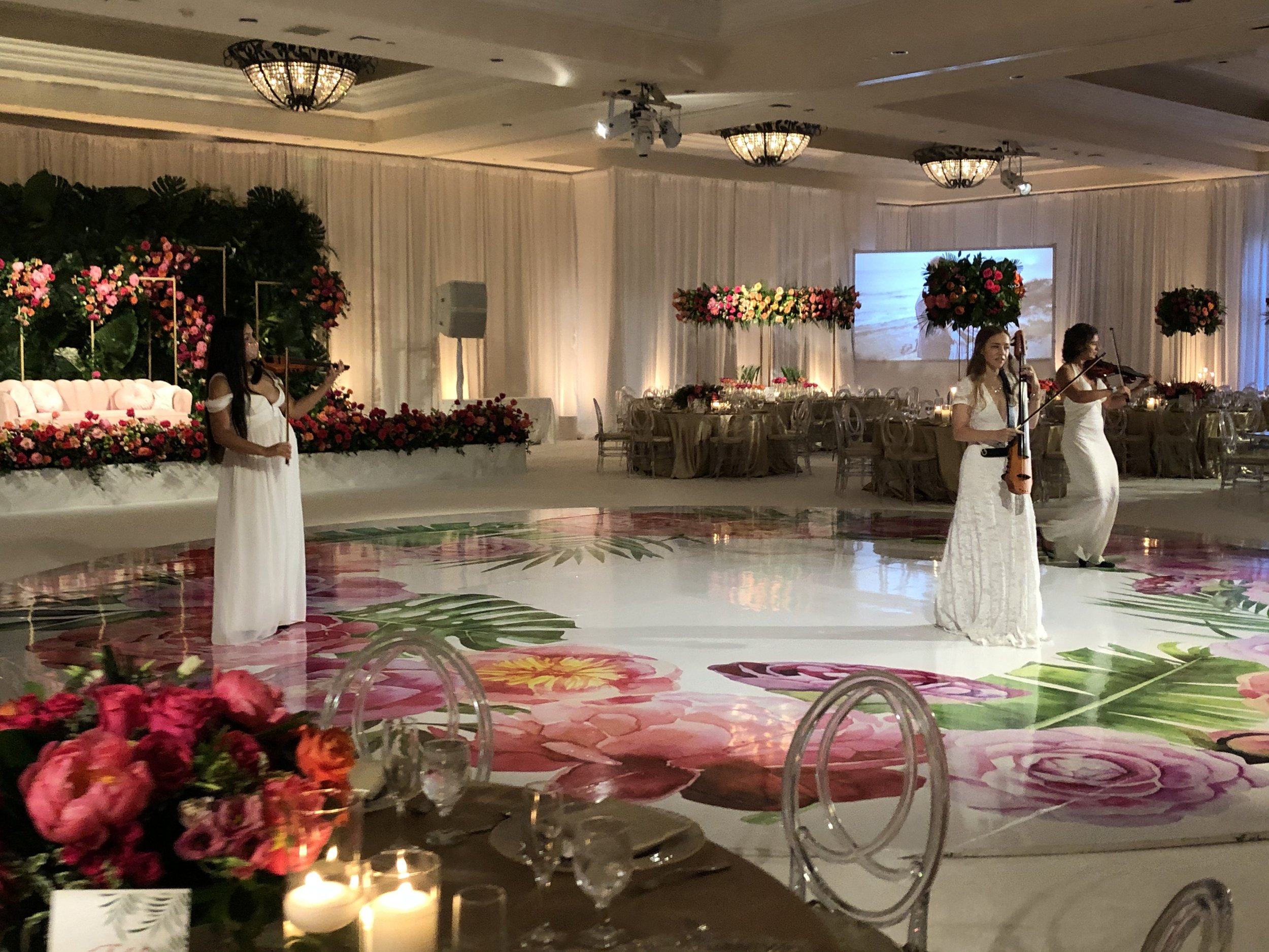 Electric string quartet performing modern wedding music with a polished setup in Los Angeles