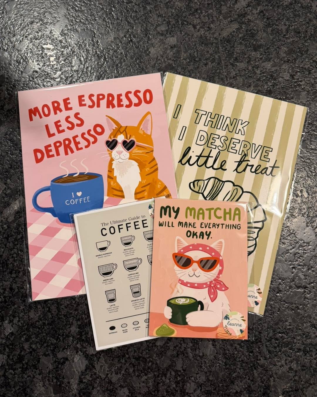 ‼️NEW MERCH ALERT‼️ we have the world&rsquo;s cutest prints available now in store!! ☕️😻
&bull;
&bull;
&bull;
#cafe #cocktail #mocktail #ohio #smallbusiness #coffeeshop #sanduskyohio #book #sandusky #bookstore #cheeseboard #coffee #bar #smallbusines