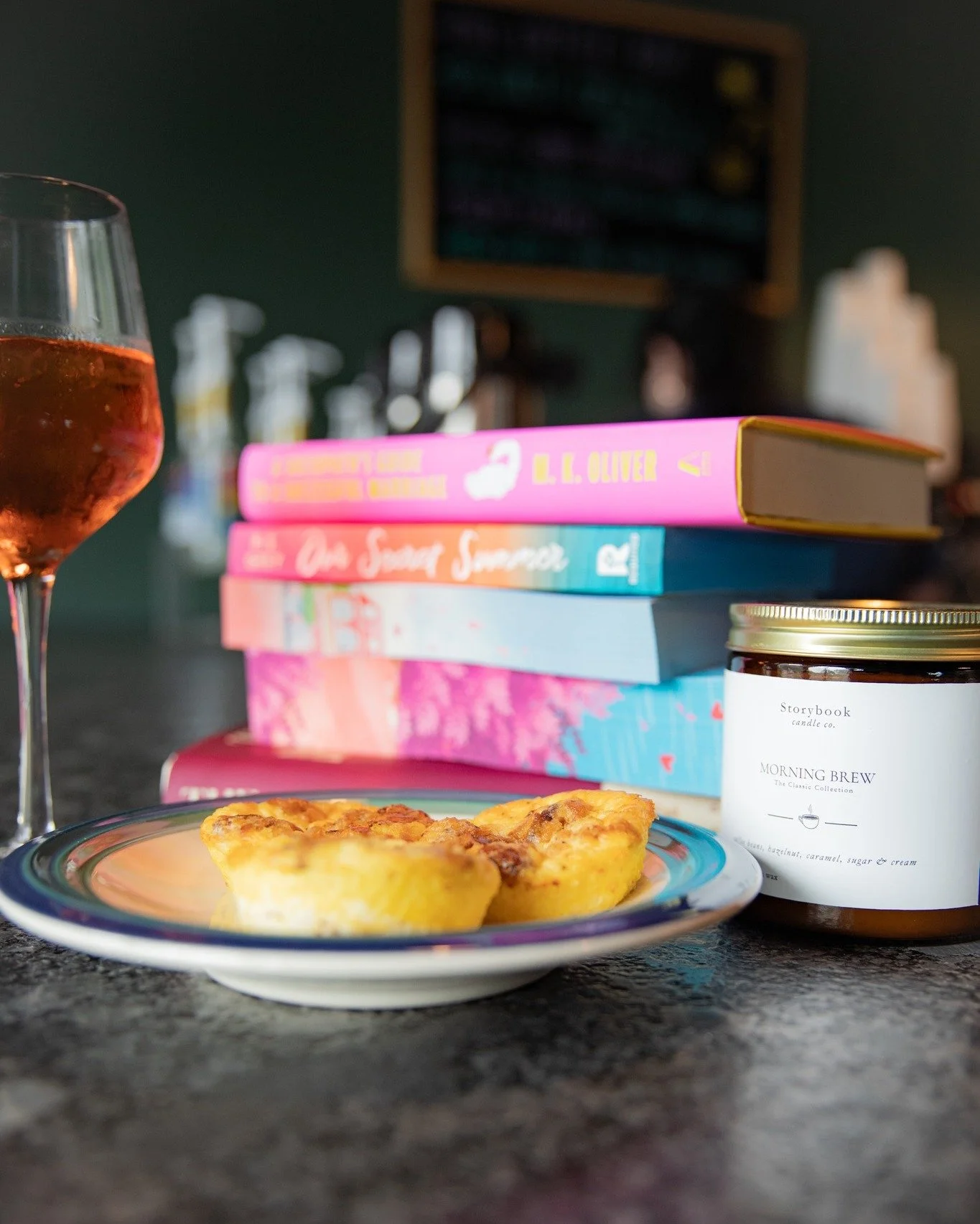 The recipe for a perfect night in one picture: Girl dinner (egg bites and an Aperol Spritz), new reads, and a candle to enjoy later! 📖🥂
*
*
*
 #sanduskybookbar #smallbusinessowner #bar #coffee #bookstore #sanduskyohio #coffeeshop #smallbusiness #mo