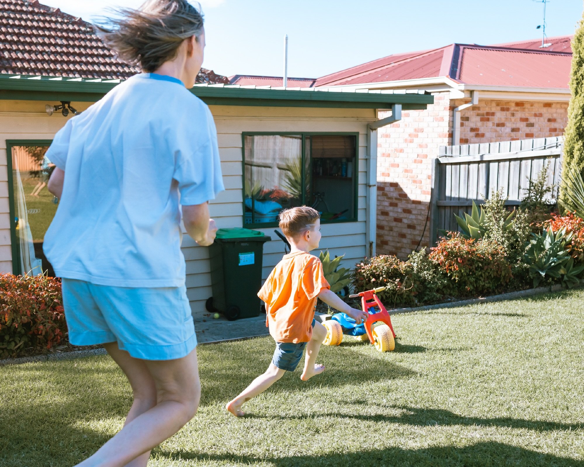 This is the kind of afternoon people can assume is too &ldquo;boring&rdquo; for professional photos.

Backyard games. Chalk. Trikes. Dirty feet. Someone yelling from the trampoline, another child disappearing inside to grab another toy to drag out ba