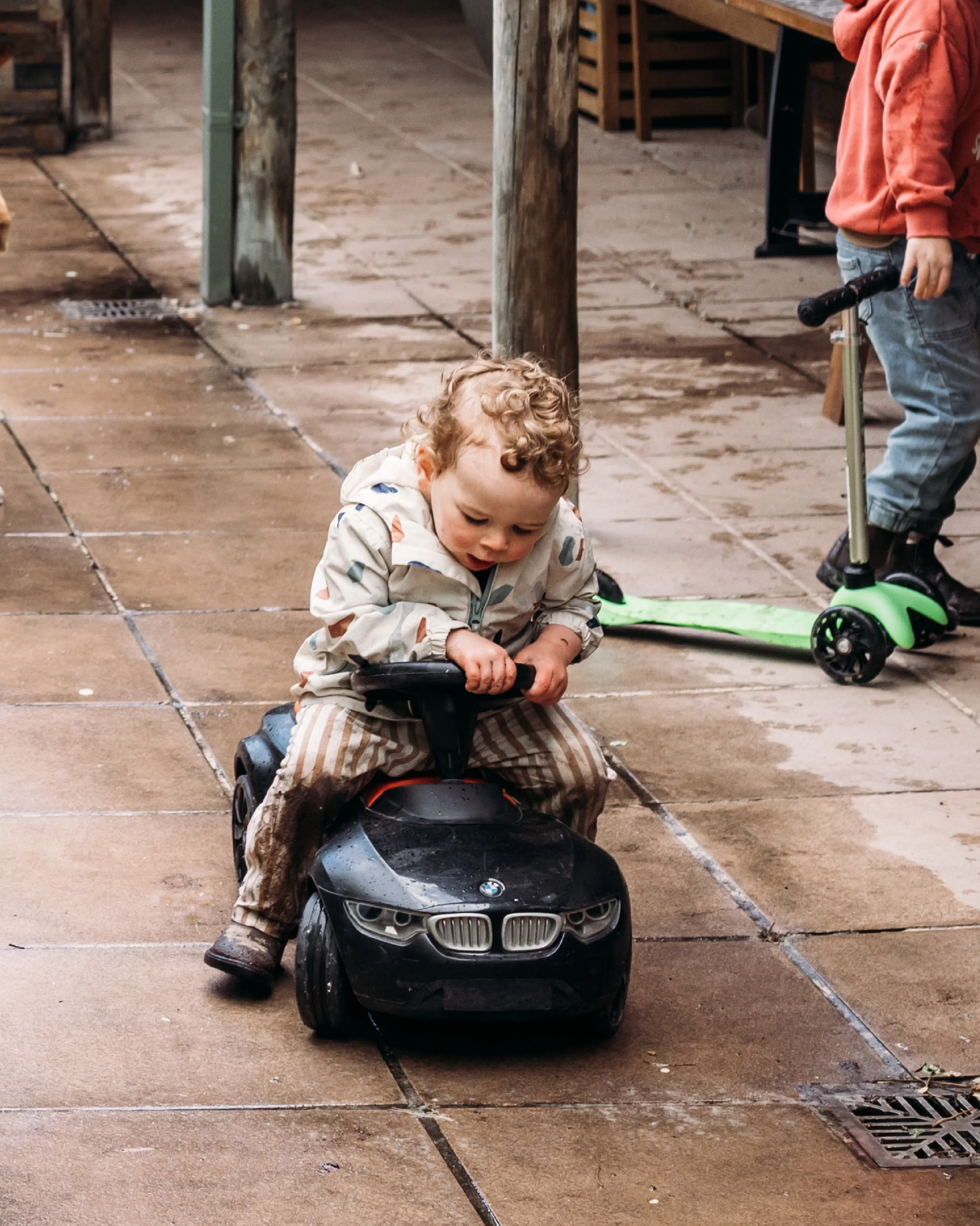Mud on his hands, rain in his hair, and absolutely zero interest in me (iconic).

I just followed him. Through the garden bed (yep, straight through), around the yard in his little car, and into every puddle he could find.

This is what I mean when I