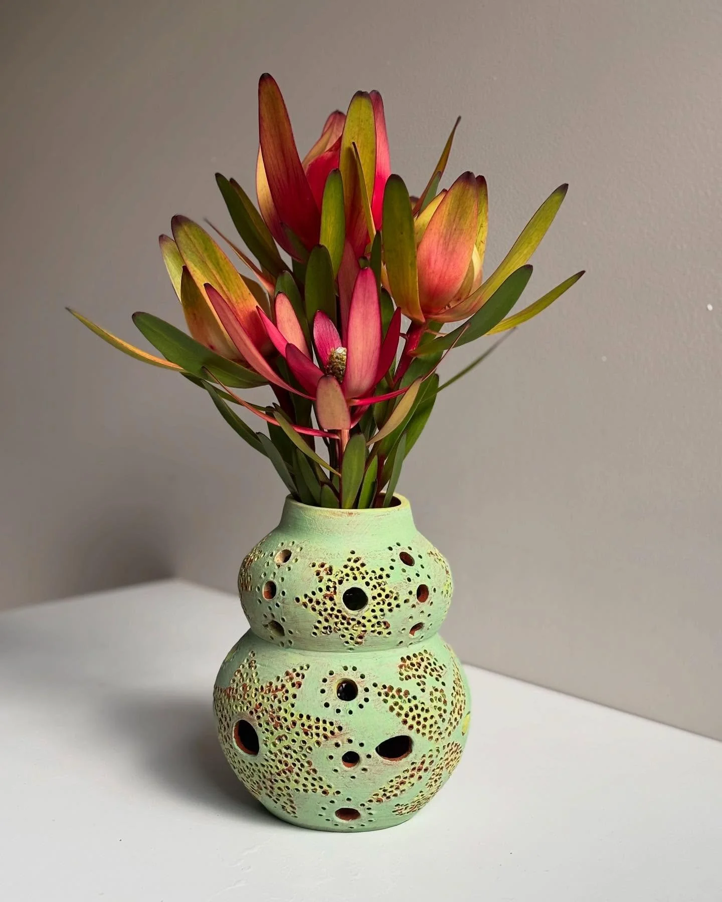 Jam jar vase - this vase has many holes but it&rsquo;s been made to hold a (caper) jar for water or candle as you desire
#australianceramics #ceramicsaustralia #functionalceramics #cobaltandkin