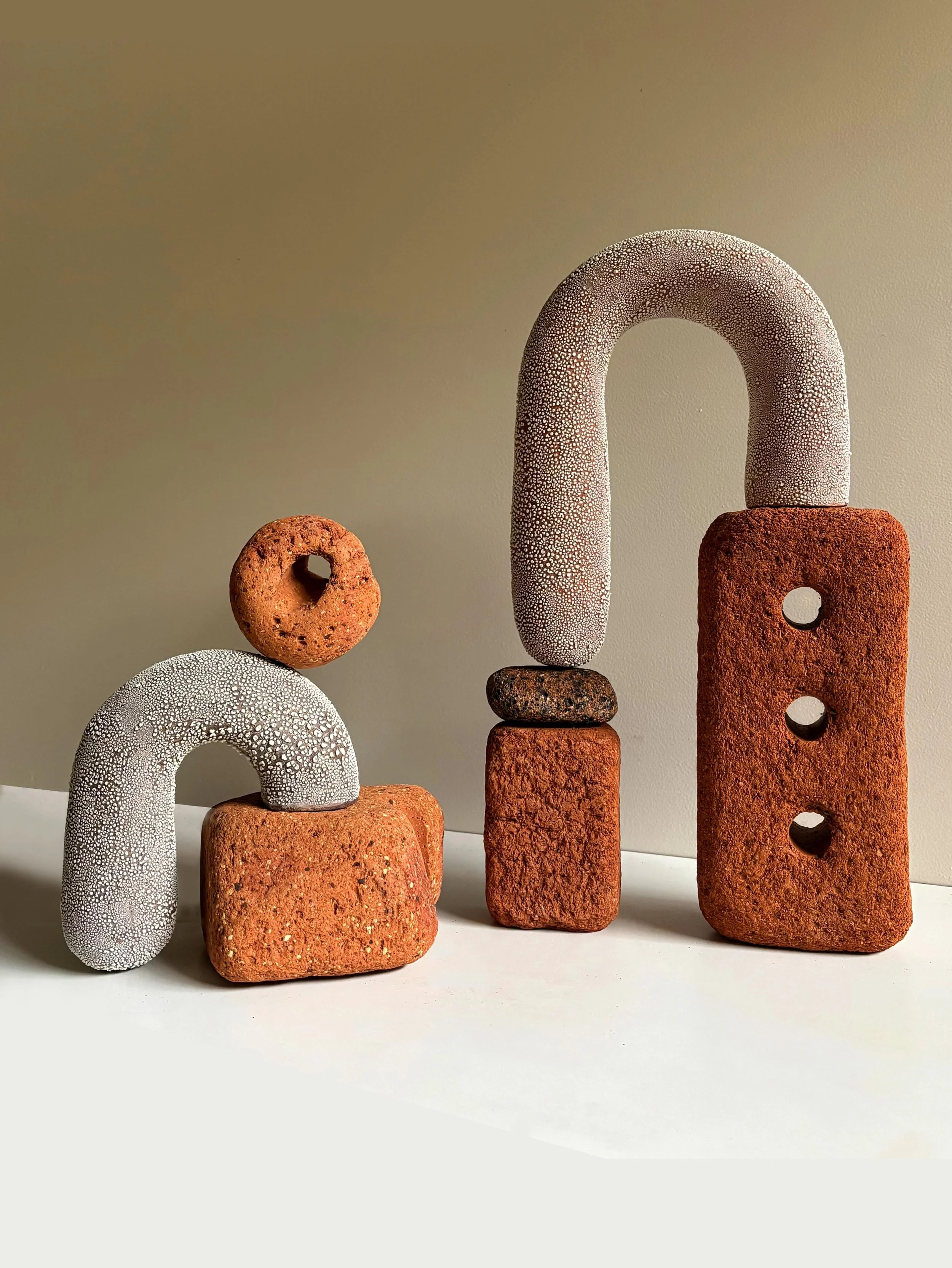 While making pieces for my recent exhibition I enjoyed placing the sculptures next to each other to see if they spoke to one another.
I think using the same materials and the filter of my hand meant that there was a shared language to the works.

I&r