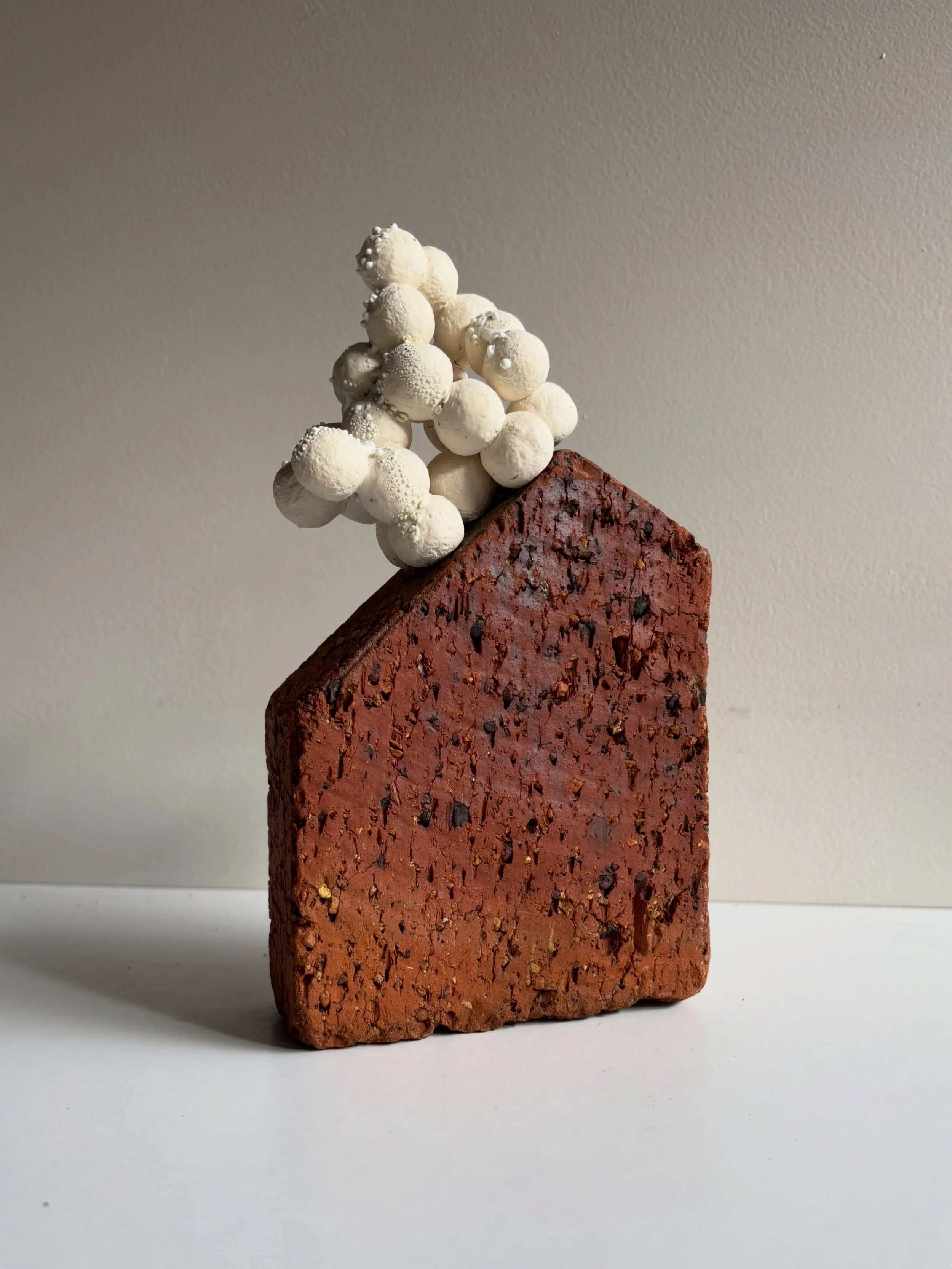 Rock Shelf Beacon. Found sea tumbled brick, stoneware clay, glaze. 2026.

Available at @boomgallery