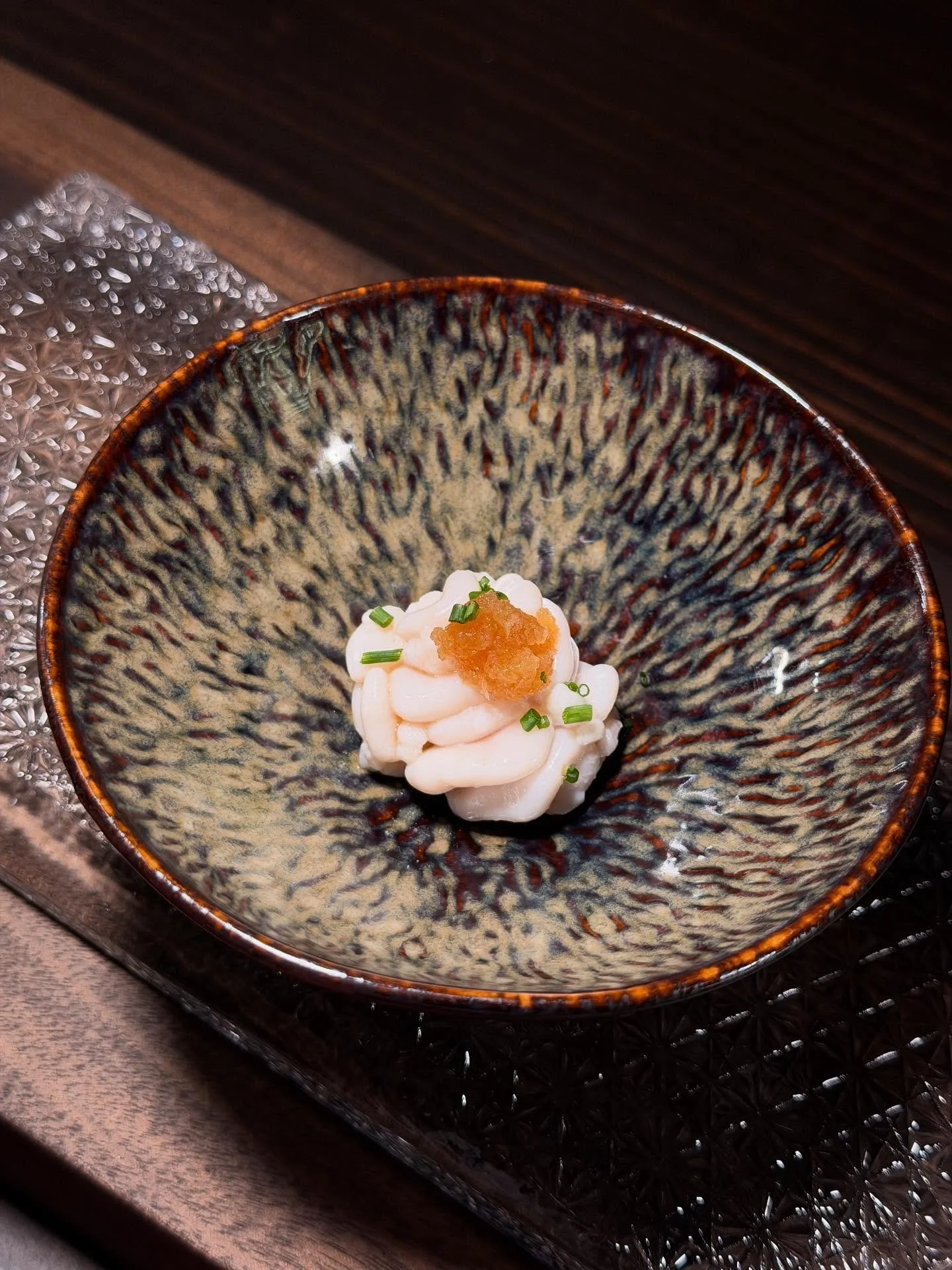 The first whisper of winter.
Shirako &mdash; the milt of cod &mdash; arrives at the very beginning of its season. Early, delicate, and pure. We serve it lightly prepared, paired with daikon oroshi and our house-aged sauce &mdash; a modern interpretat