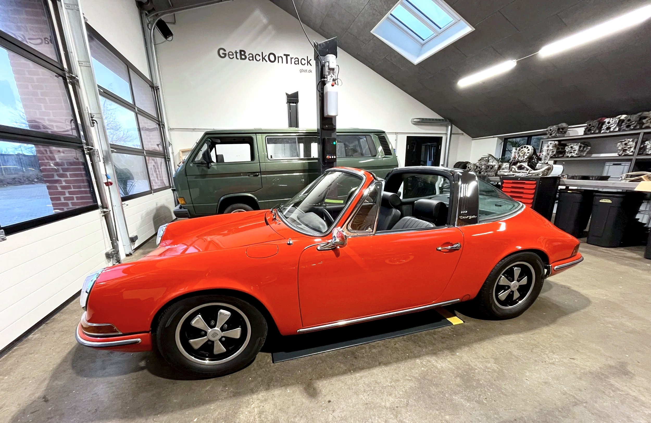 Early Porsche 911 Targa waiting for an engine upgrade. 