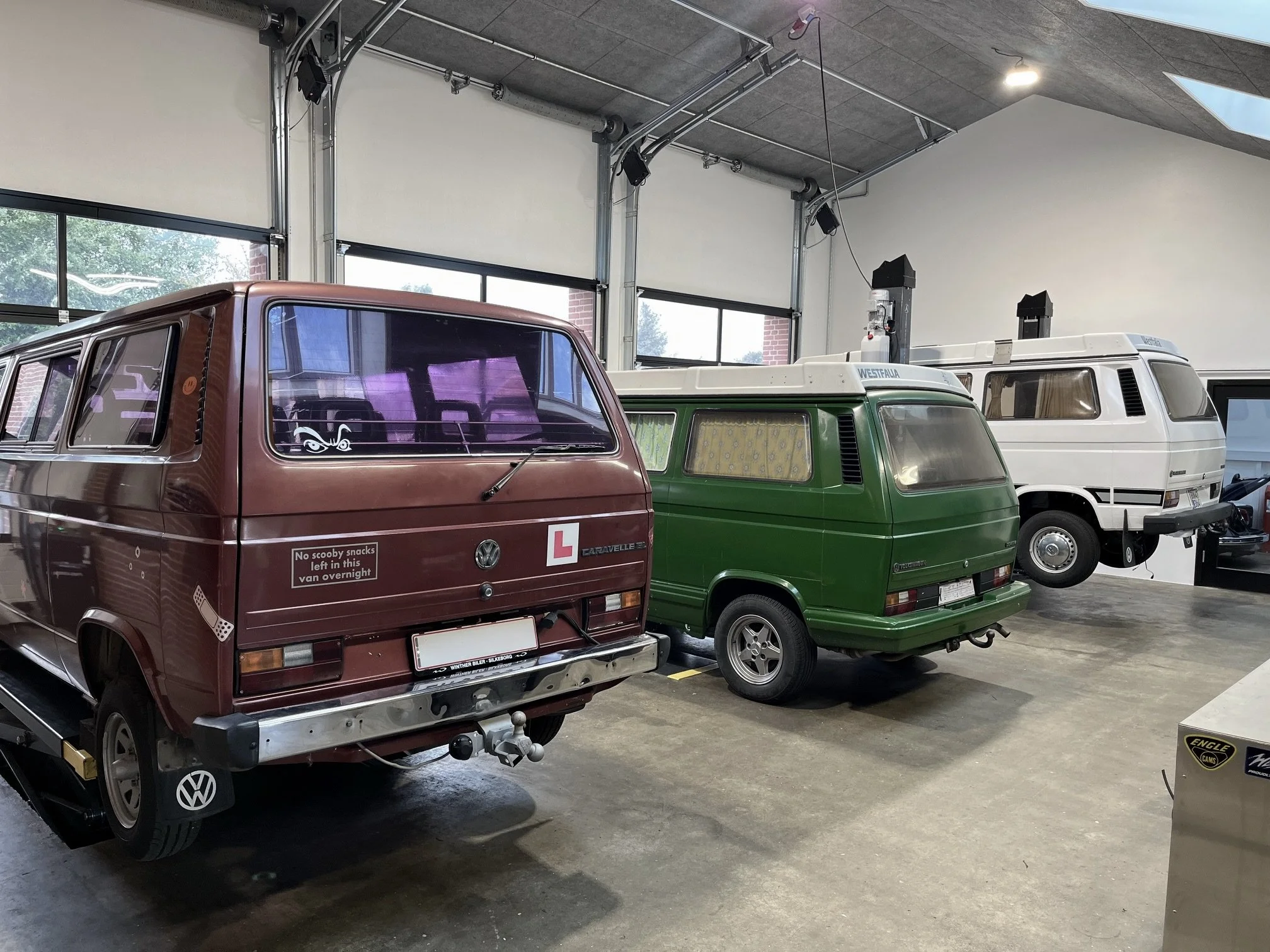 Three T3s in the workshop for engine service and main rep. respectively. 