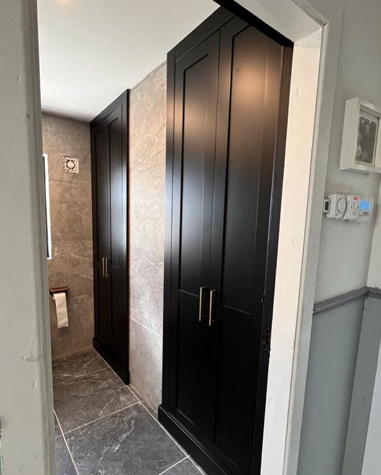 This weeks transformation- swipe for before ➡️➡️
This customer wanted to transform and modernise this storage space in their bathroom, so we did just that. 

They went with a Matt Black spray finish on the doors with a nice gold bar handle to match, 