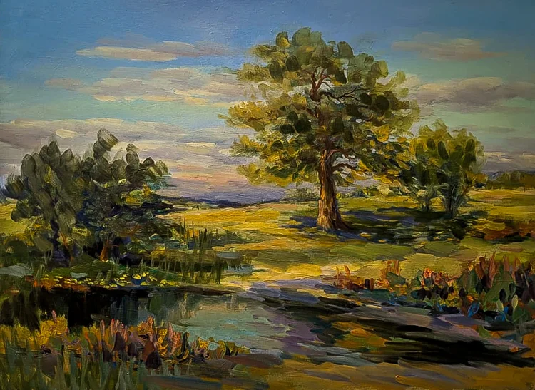 Großer Baum am Fluss