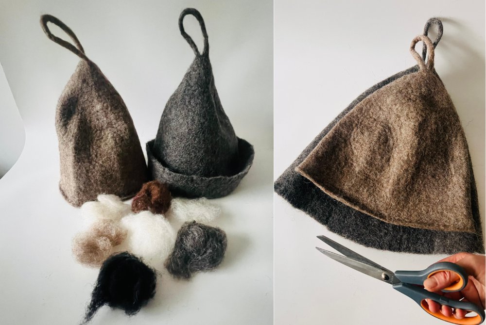 Brown and dark gray wool sauna hats with loops beside tufts of raw wool in seven natural shades, and the hats laid flat with scissors for trimming