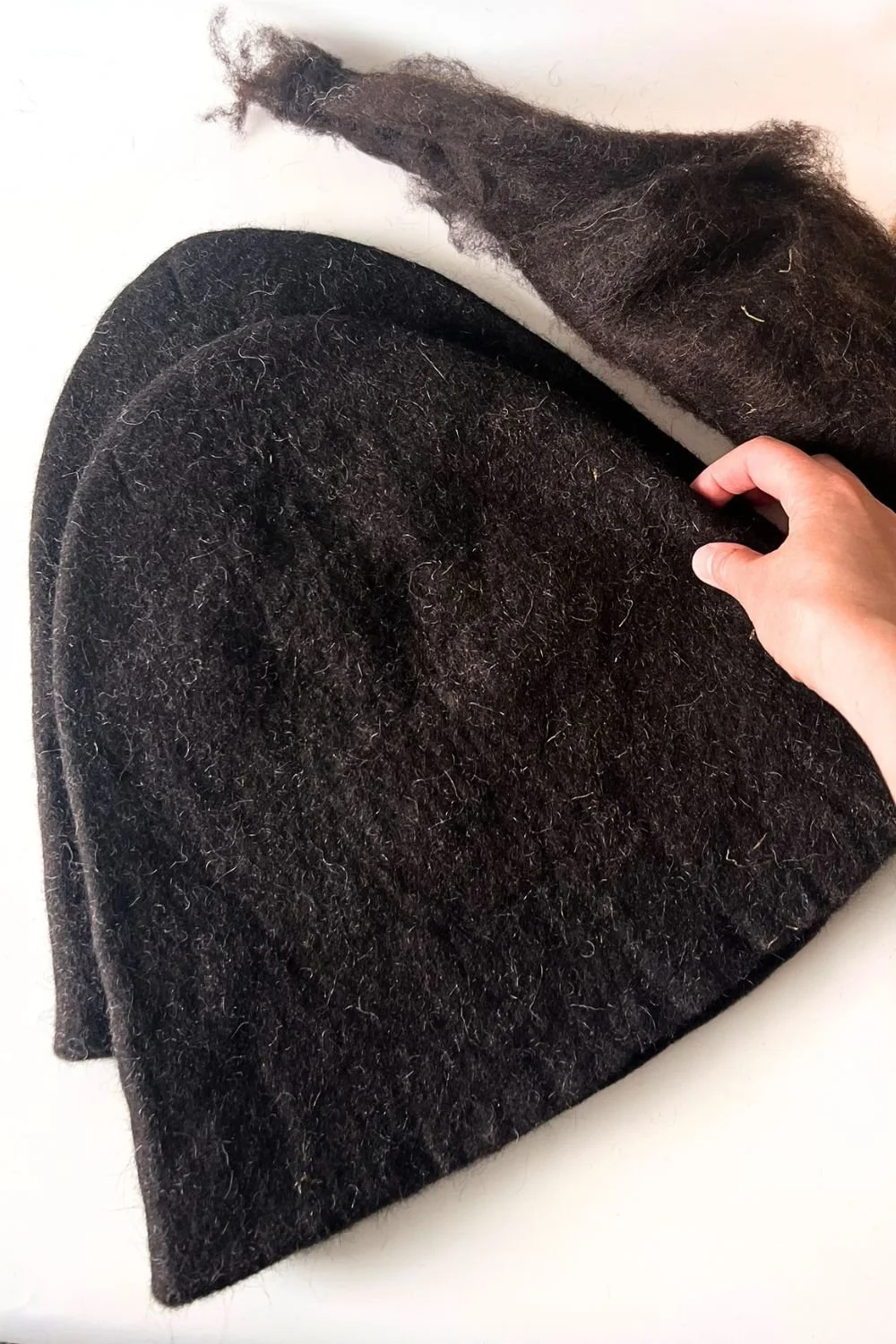 Deep Earth Black shade — a rich, undyed charcoal for wood-cabin and low-light saunas.