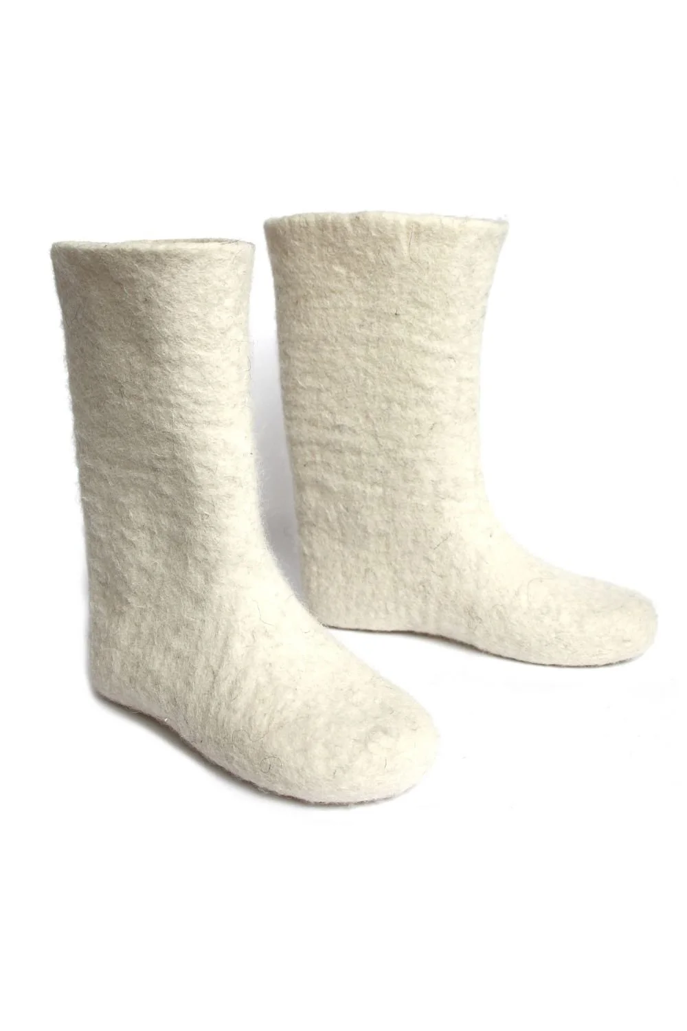 Feltforma handmade white wool boots hand-felted from undyed mulesing-free Tyrolean mountain wool in Vilnius, Lithuania — available on request, custom fit, water-washed only, glue-free and plastic-free