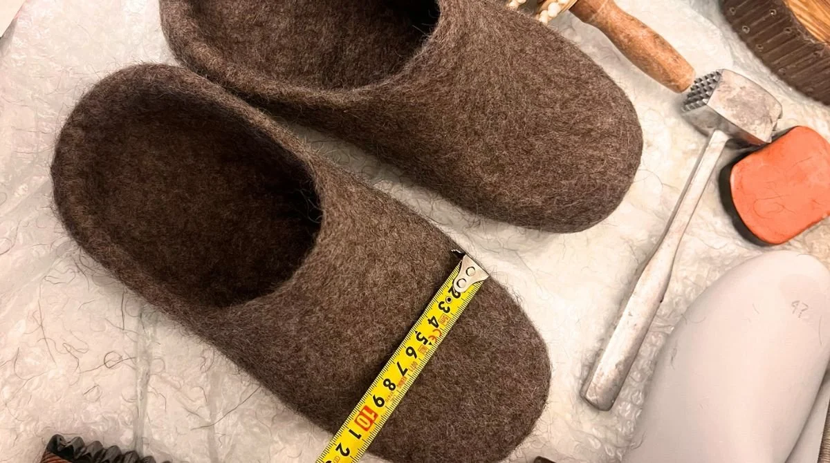 Wide fit wool slippers for plantar fasciitis measured to exact barefoot width — handmade from undyed Tyrolean mountain wool, zero-drop, wide toe box, no synthetic materials. Made to order in Vilnius, Lithuania. Ships duty-free to the USA.