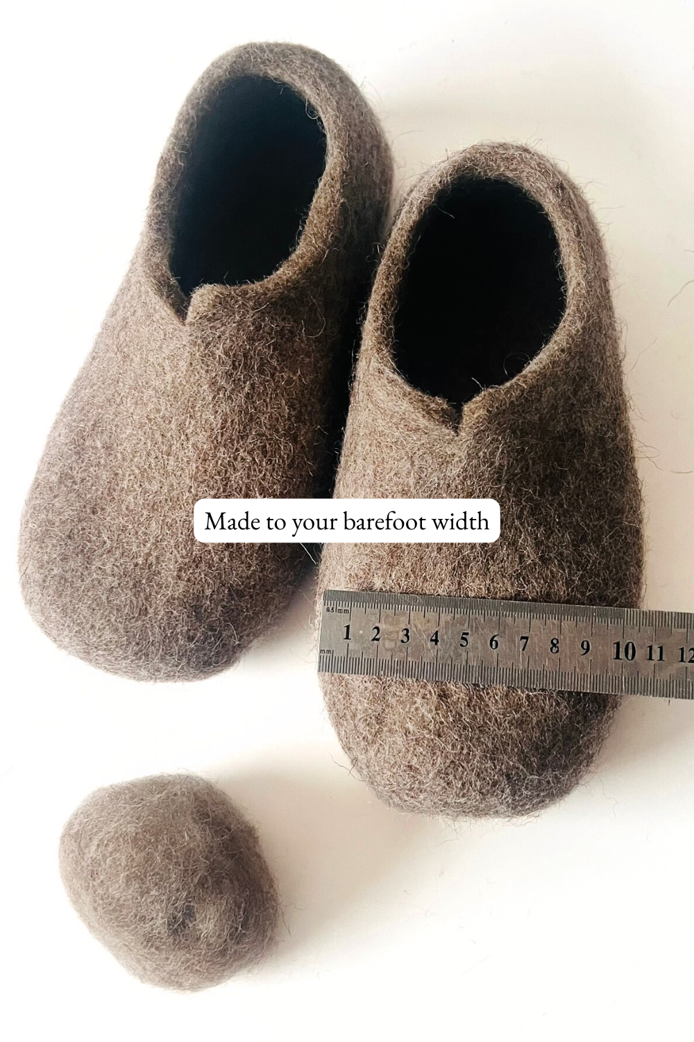 Handmade wide fit wool slippers for bunions and wide feet — measured to your exact barefoot width. Seamless, no glue, no synthetic materials. Natural Tyrolean mountain wool. Made to order in Vilnius, Lithuania. Ships duty-free to the USA.