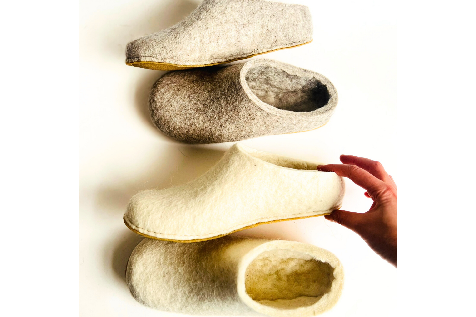 Undyed wool slippers made from raw mountain sheep wool, designed for grounding comfort before and after sauna