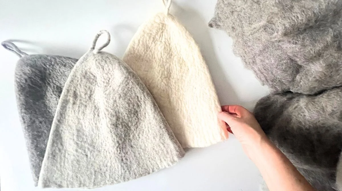 Handmade undyed wool sauna hats in natural grey and cream for infrared sauna — sculpted from Tyrolean mountain wool, no dyes, no synthetic materials. Made to order in Vilnius, Lithuania. Ships duty-free to the USA.