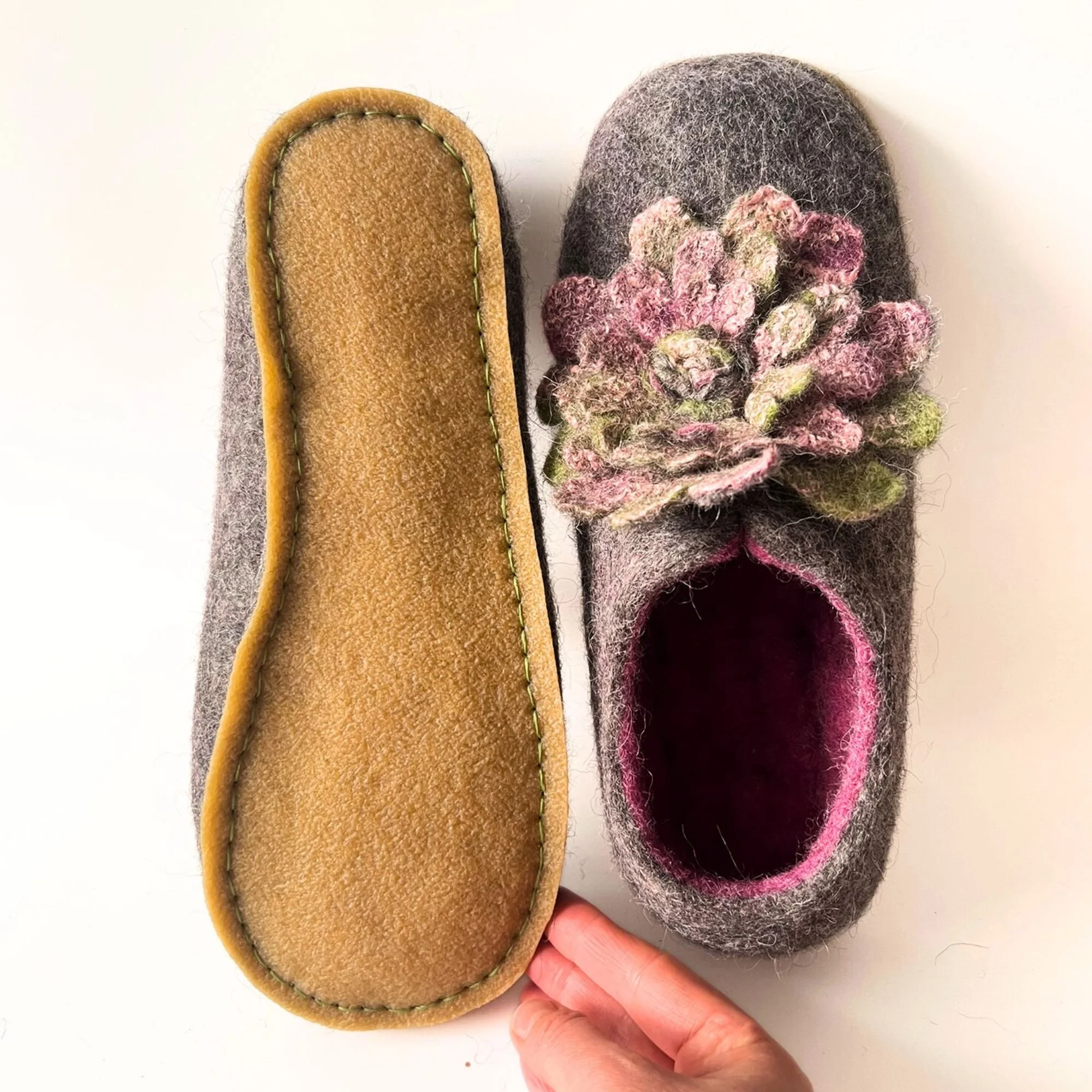 Handmade wool house shoes for women with sculptural felted flower detail and natural breathable wool construction